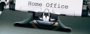 Typewriter with words "Home office" being typed