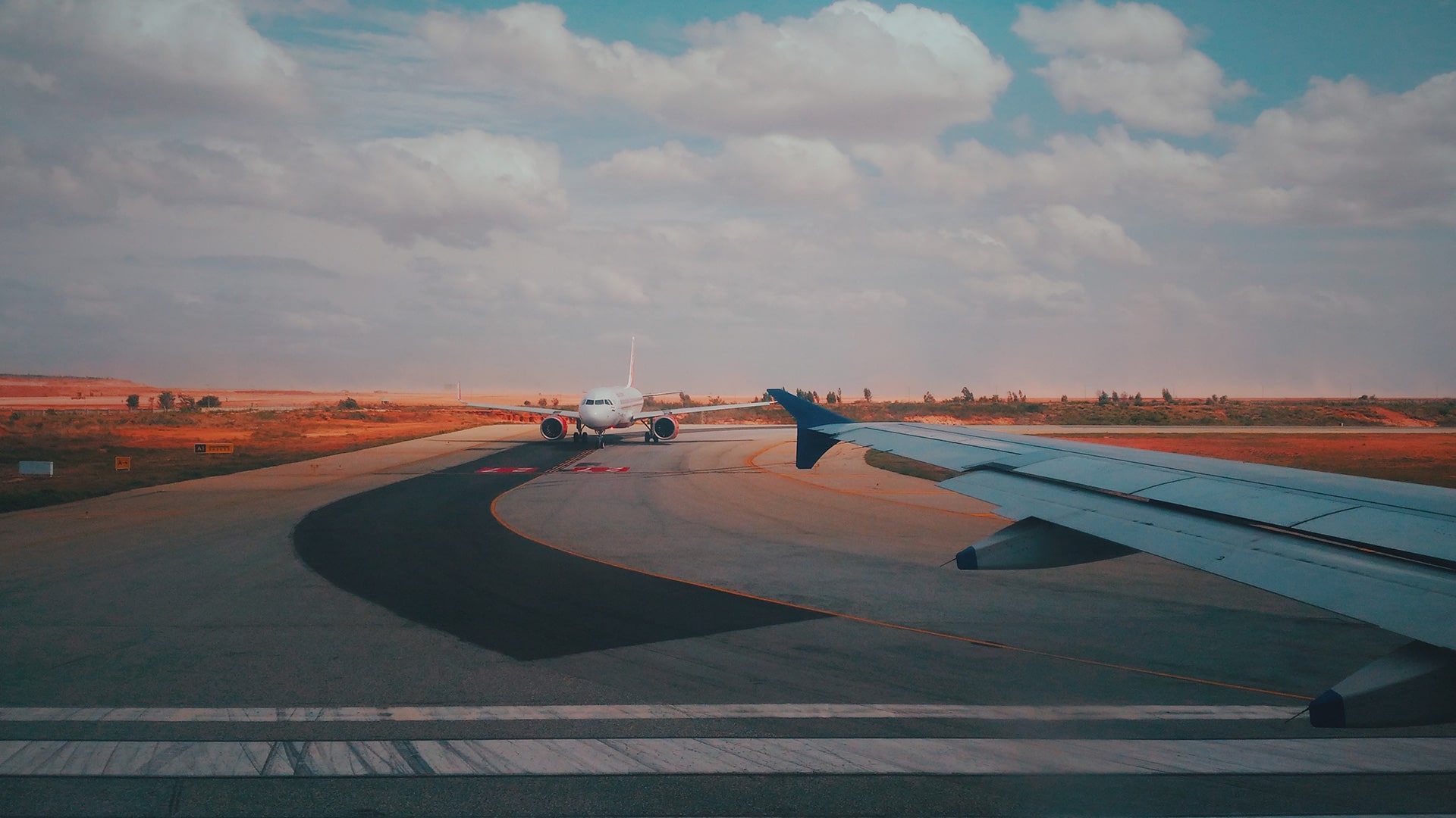 planes taxiing on runway