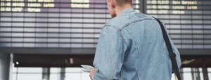 Man expecting his flight at the airport